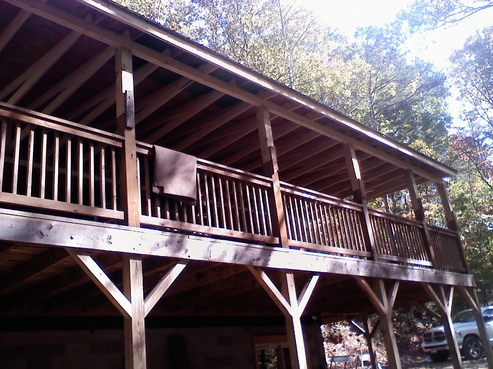 Timber framing under a new elevated porch and deck — Roof Leak Repair in Depoe Bay by Roofing Brothers